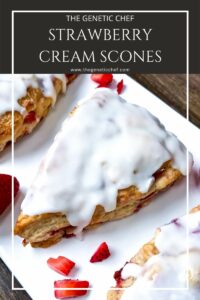 Three iced strawberry scones on a white platter.